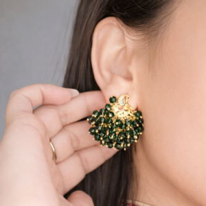 Intricate green jhumka earring